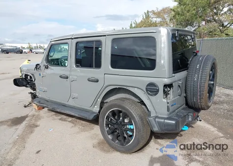 2022 Jeep Wrangler 4Xe Unlimited Sahara 4X4 z USA, uszkodzony, nr VIN 1C4JJXP63NW103051